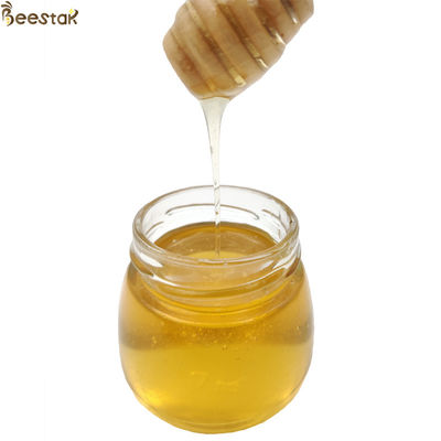 comprar Mel de flor Wubei 100% natural Mel de abelha com cor âmbar clara 18,7% Umidade e 73,4% Redução de açúcar fabricação em linha