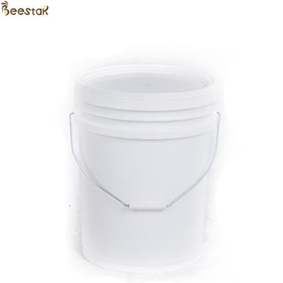 comprar Tanque de mel de plástico amarelo branco com porta de mel para armazenamento de mel fabricação em linha