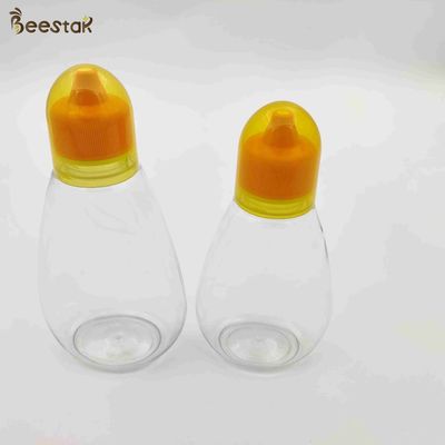 comprar 250ml 350ml 500ml Honey Jar And Spoon Plastic Honey Bottles vazio para o armazenamento do mel fabricação em linha