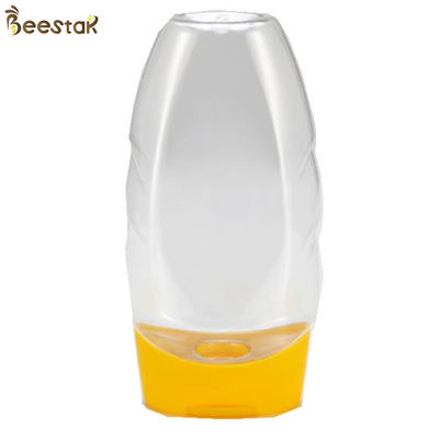 comprar Preço de fábrica plástico Honey Jar And Spoon plástico especial do produto comestível 335ml vazio fabricação em linha
