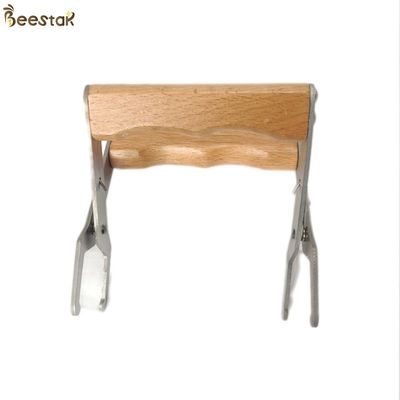 comprar A apicultura da apicultura utiliza ferramentas o aperto de aço inoxidável do quadro da colmeia da abelha com punho de madeira fabricação em linha