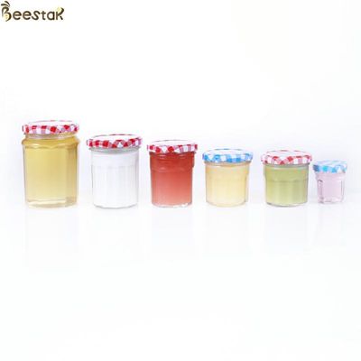 comprar boca de 150ml 200ml 250ml 380ml Honey Jar And Spoon Wide com a tampa fina do metal do parafuso fabricação em linha
