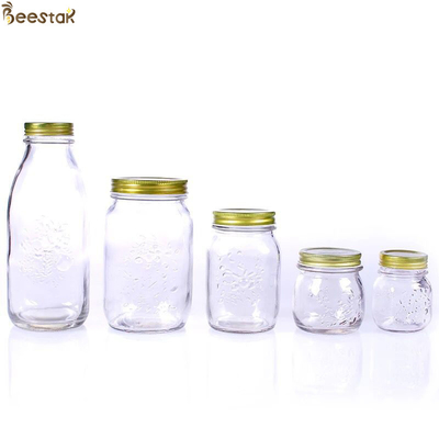 comprar Flor cinzelada Honey Glass Jar And Spoon Honey Container transparente fabricação em linha