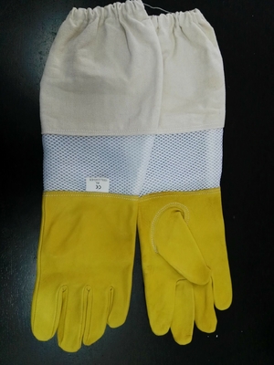 Luvas amarelas da pele de carneiro para a apicultura com a luva branca ventilada branco de pano do pulso